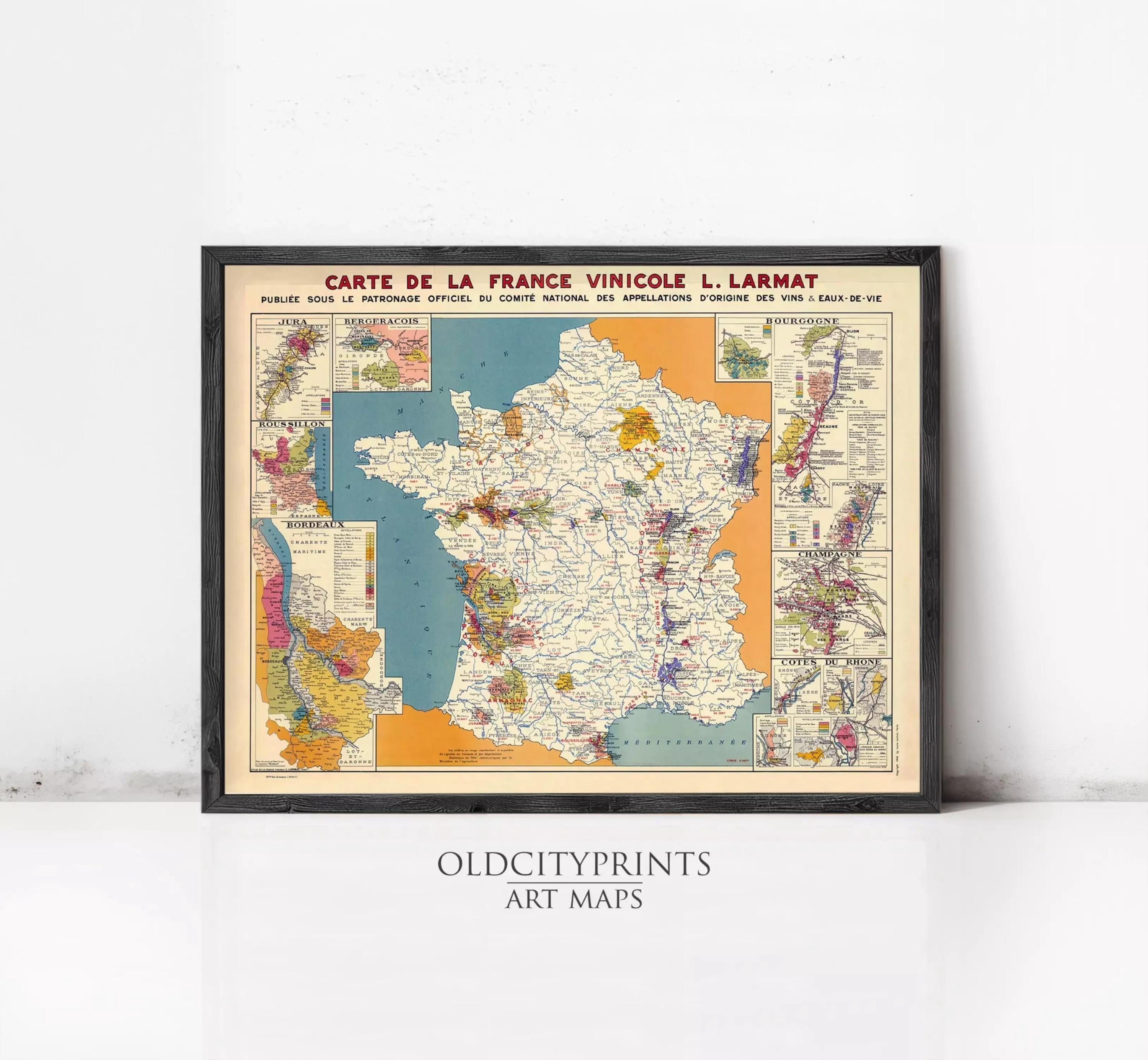 The image is a framed vintage map of France, depicting various regions and their geographical features.