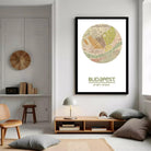 A framed vintage map of Budapest, Hungary, with the text "BUDAPEST" and the date "47.28.19.19.3 e" below the map.
