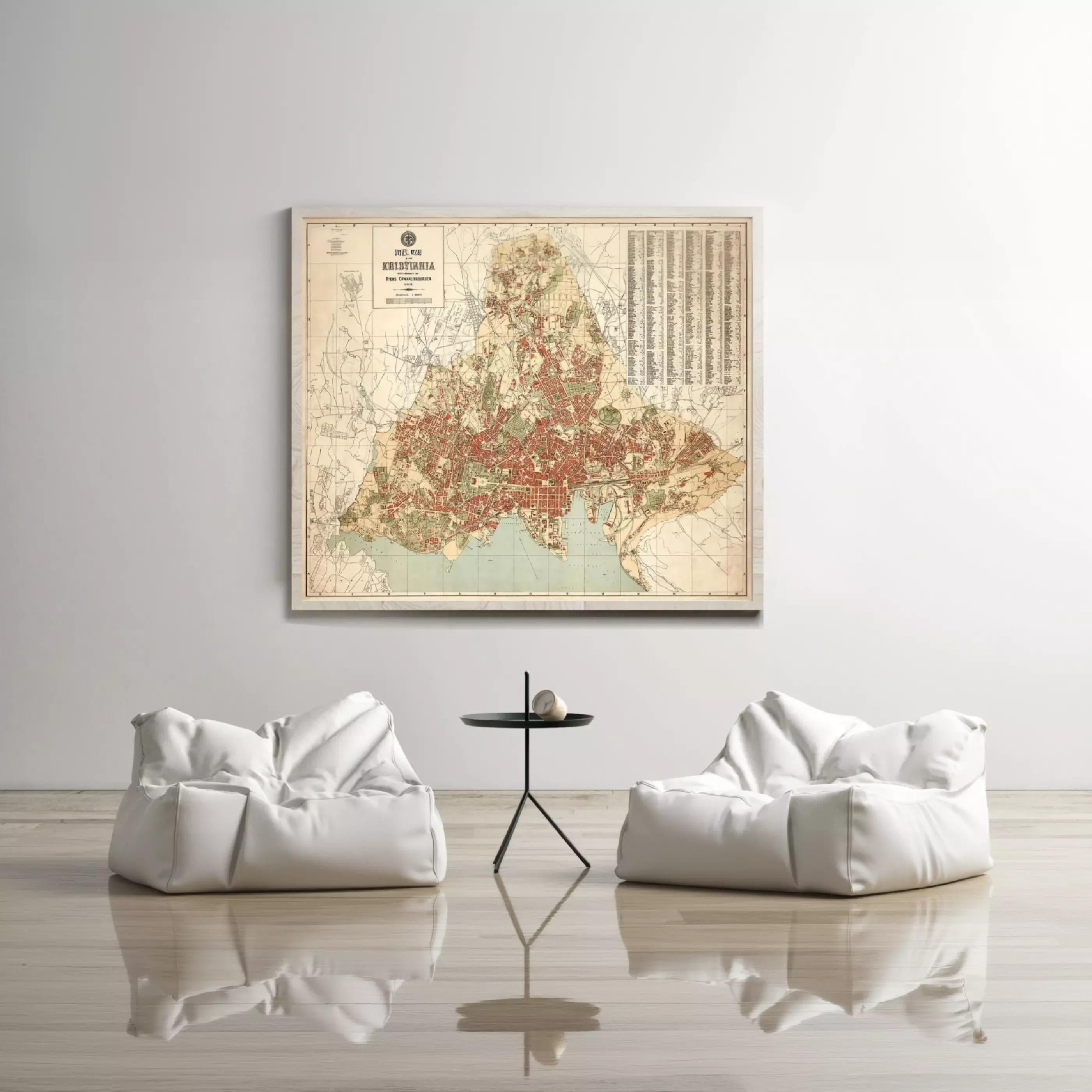 a large framed map of a region hanging on a wall, with two white bean bag chairs positioned in front of it.