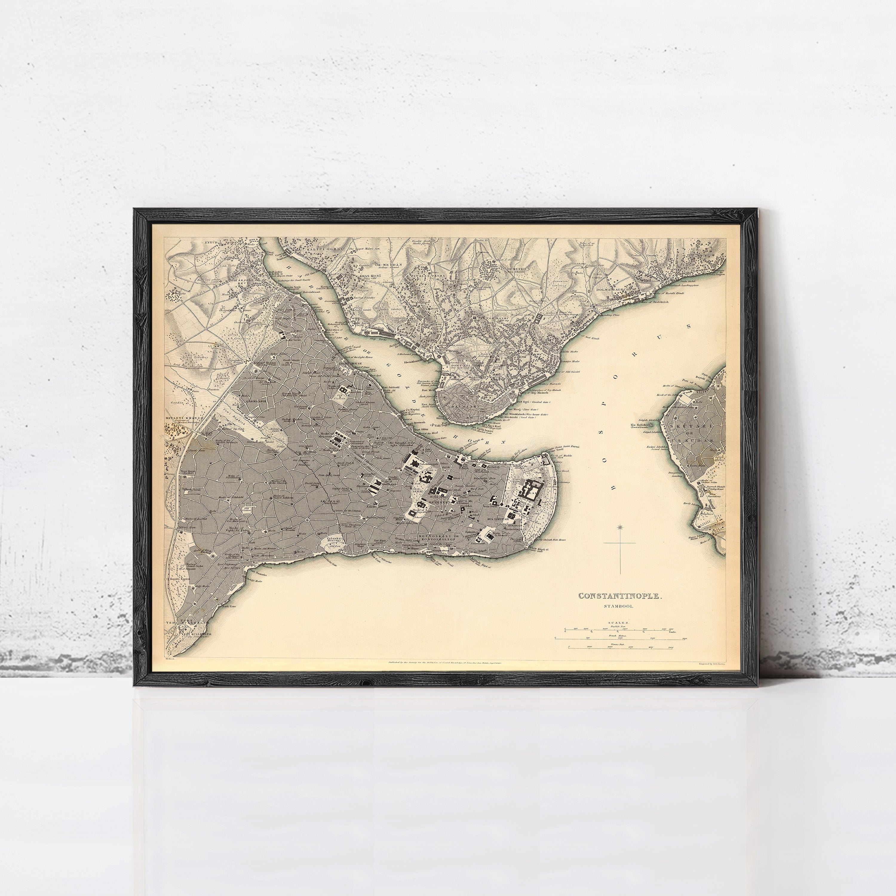 The image is a framed vintage map of the city of Istanbul, Turkey, depicting the city's streets and surrounding areas.