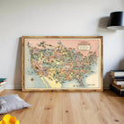 a large, colorful map of the United States, with various regions and landmarks depicted in detail.