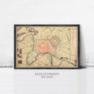 The image is a framed vintage map of a city, likely from the past, with various landmarks and streets depicted.