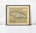 The image is a framed vintage map of Jamaica, depicting the country's geographical layout and boundaries.