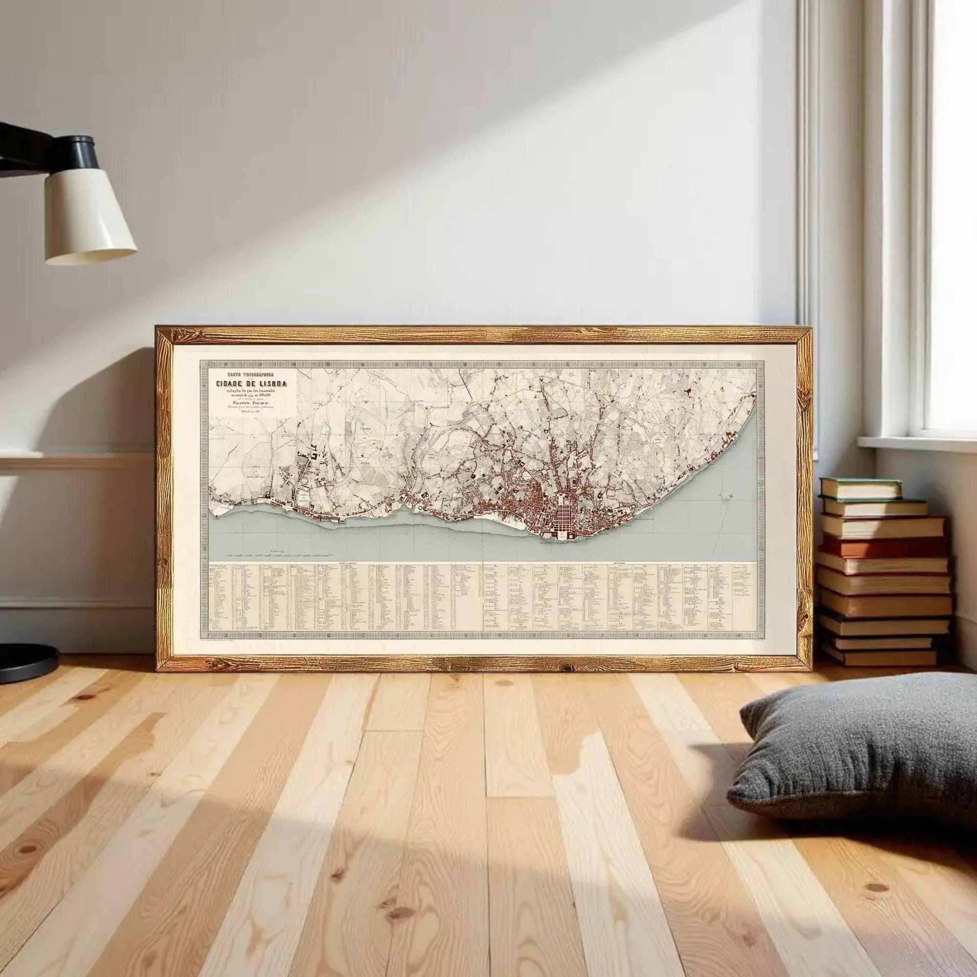 The image is a framed map of a city, likely London, with a detailed layout of the city's streets, landmarks, and other geographical features.