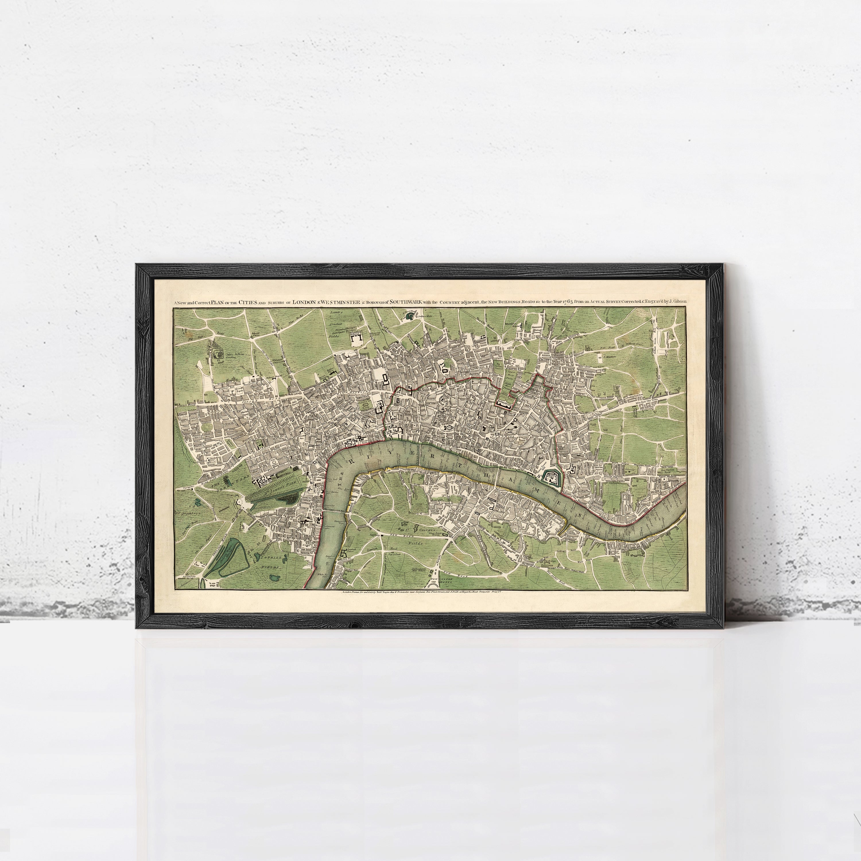 The image is a framed vintage map of London, England, depicting the city's layout and surrounding areas.