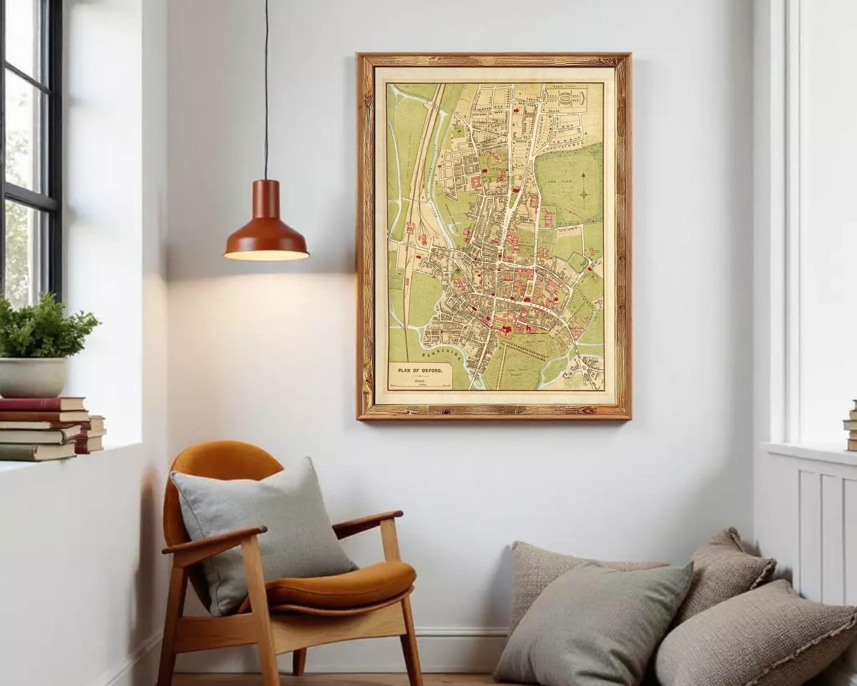The image is a framed vintage map of a city, depicting a detailed layout of streets, buildings, and other urban features.