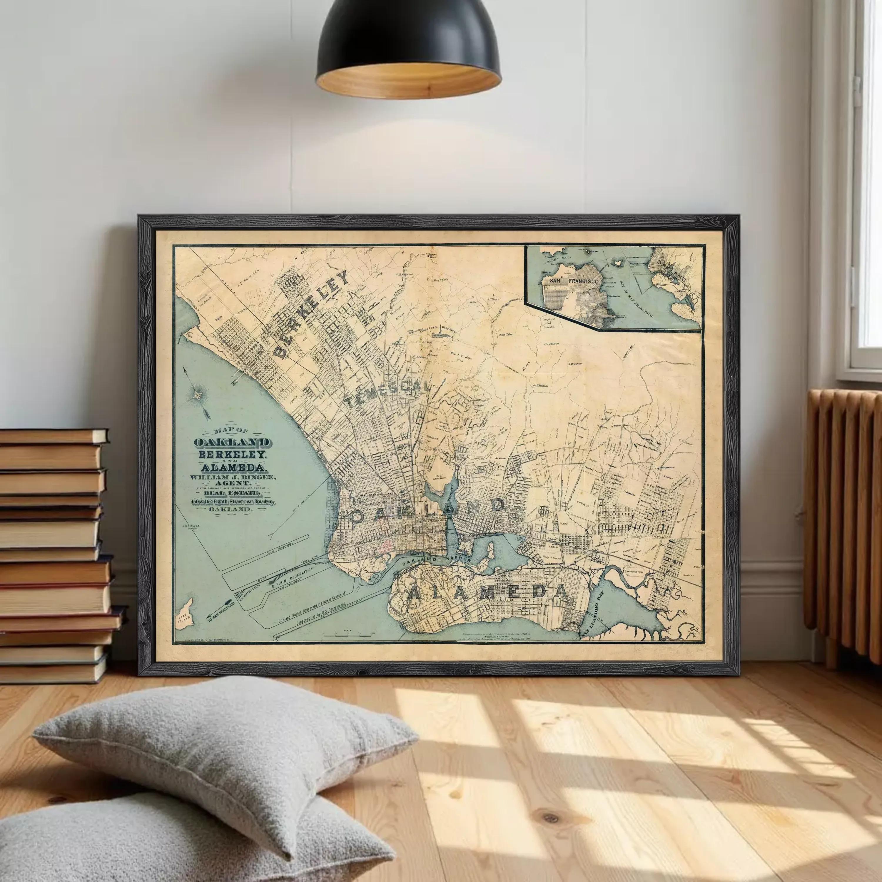 The image is a framed vintage map of Oakland, California, with a black border and a light blue background.