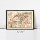 The image is a framed vintage map of Prague, Czech Republic, depicting the city's streets, landmarks, and surrounding areas.