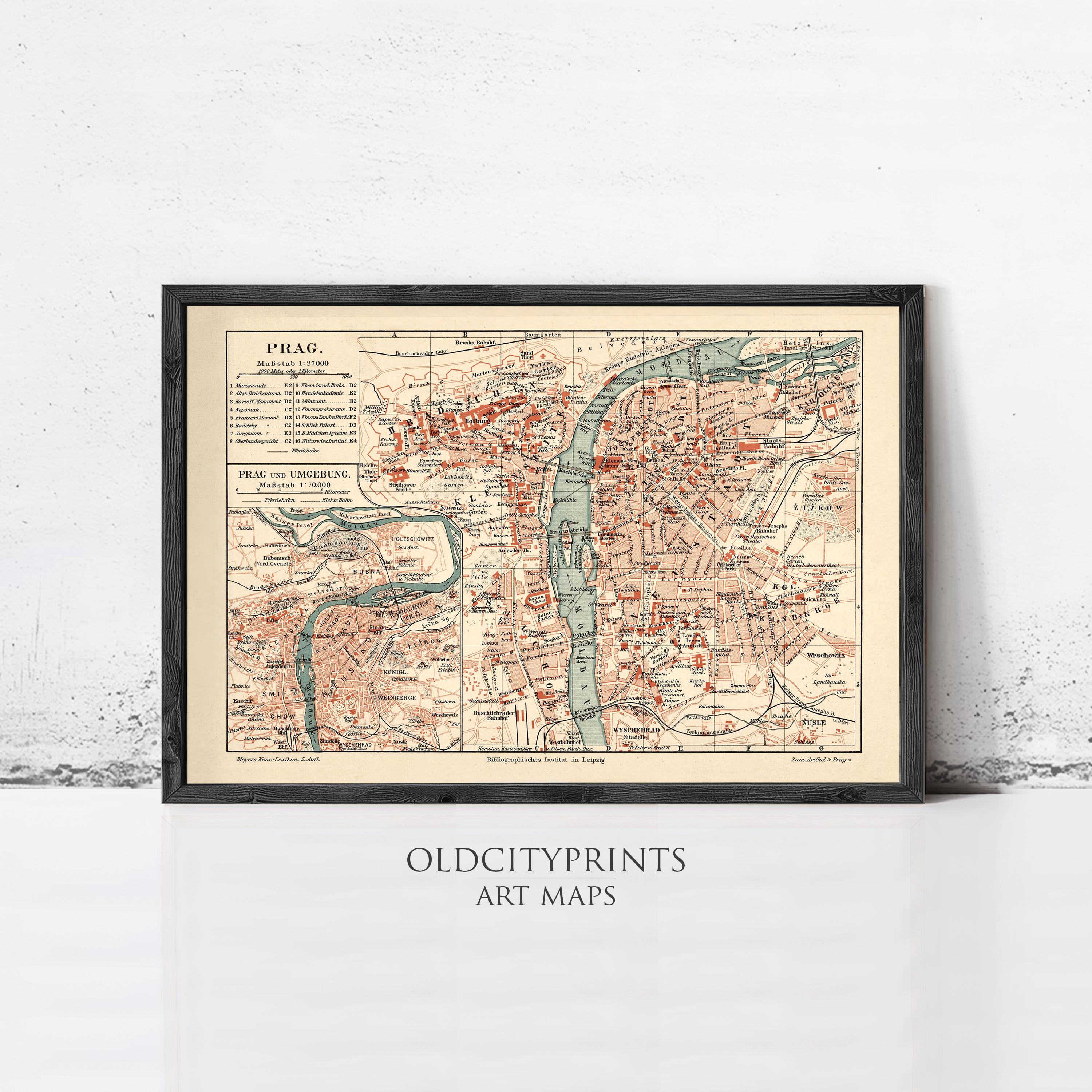 The image is a framed vintage map of Prague, Czech Republic, depicting the city's streets, landmarks, and surrounding areas.