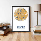 a framed map of Avignon, France, with the city's streets and landmarks depicted in a circular format.