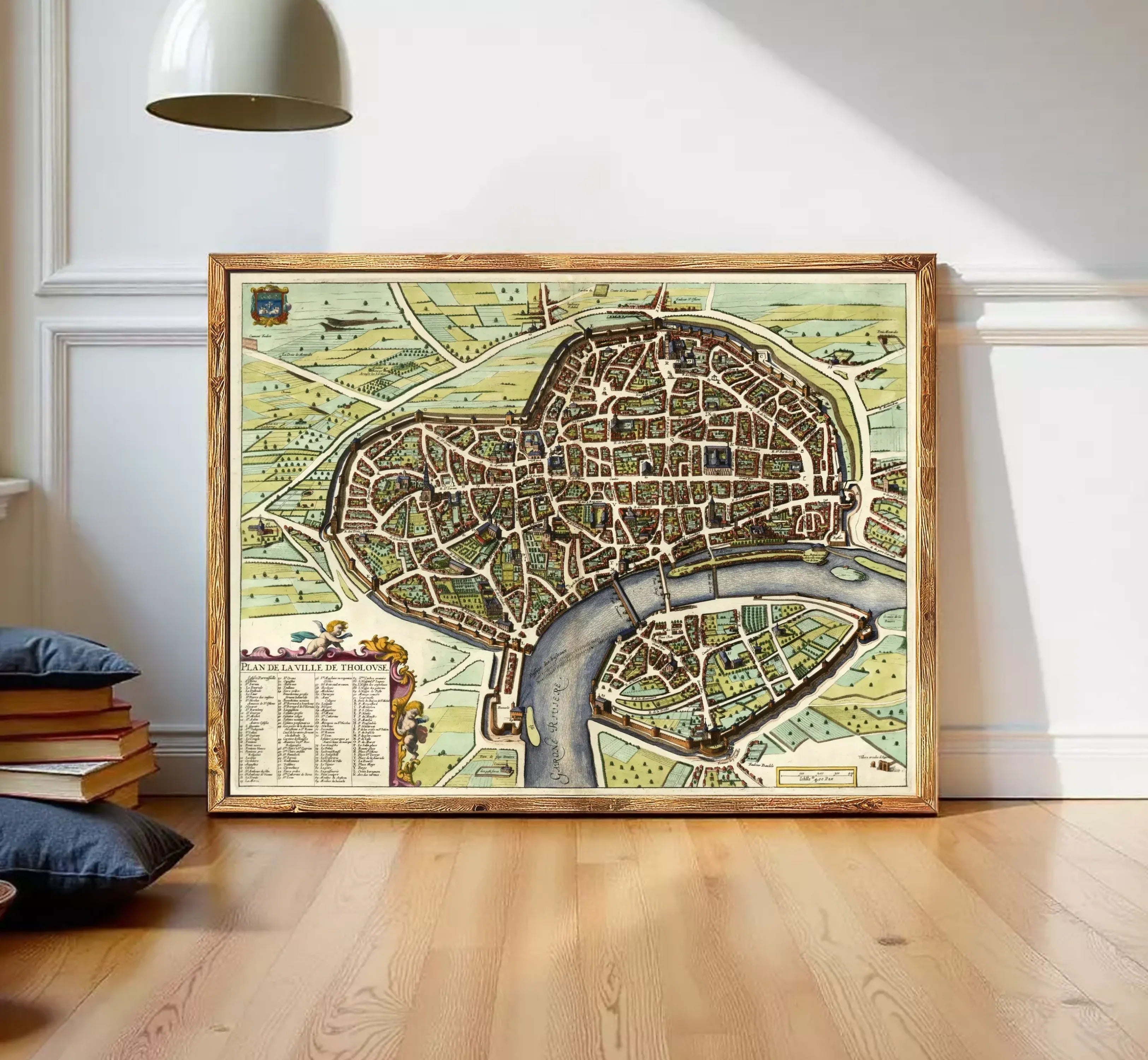 The image is a framed map of a city, likely a historical or geographical map, displayed on a wall.