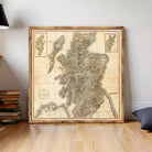 The image is a framed map of Scotland, showing the country's geographical layout and surrounding areas.