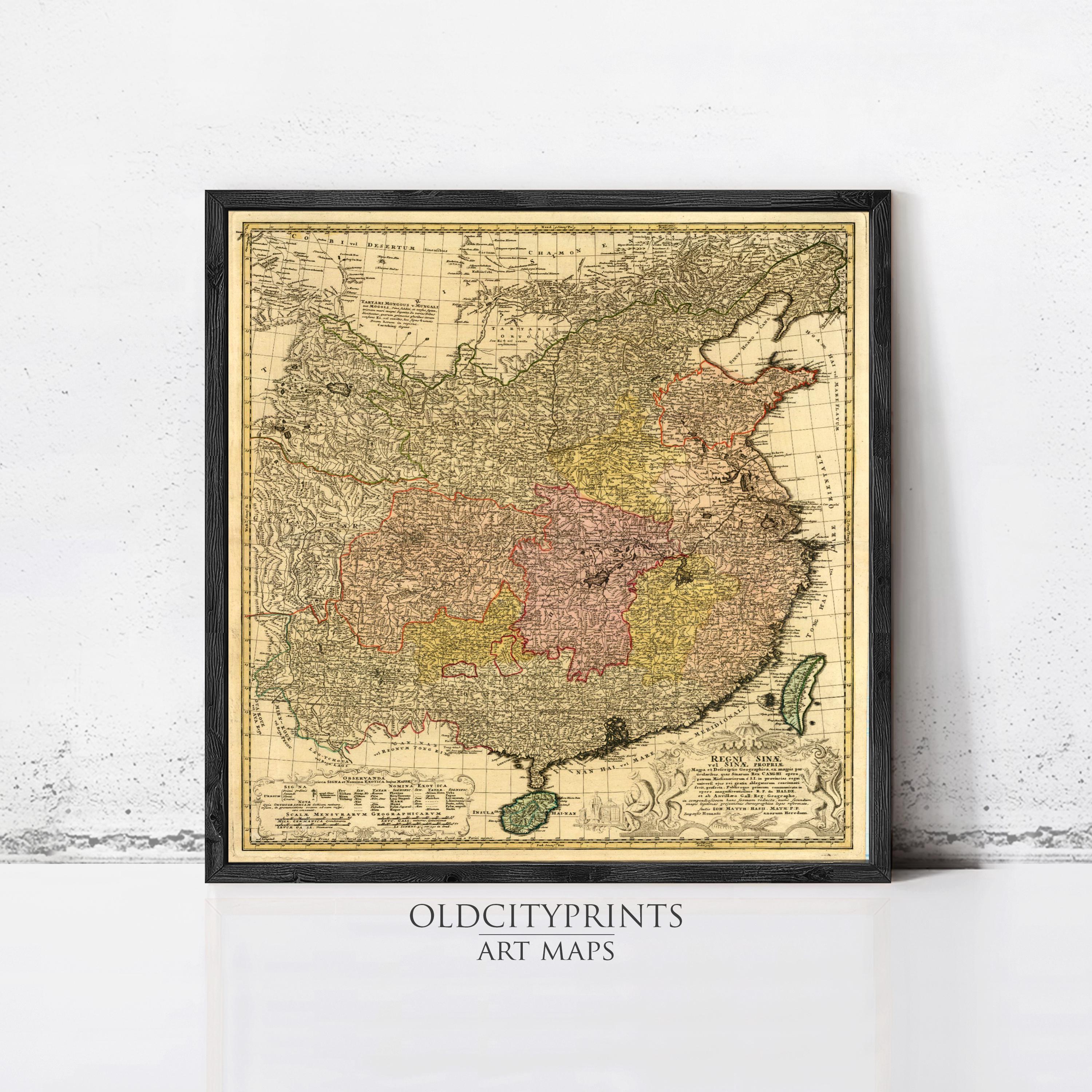The image is a framed vintage map of China, featuring detailed cartography and geographical information.