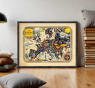 The image is a framed vintage map of Europe, featuring various landmarks, symbols, and illustrations.