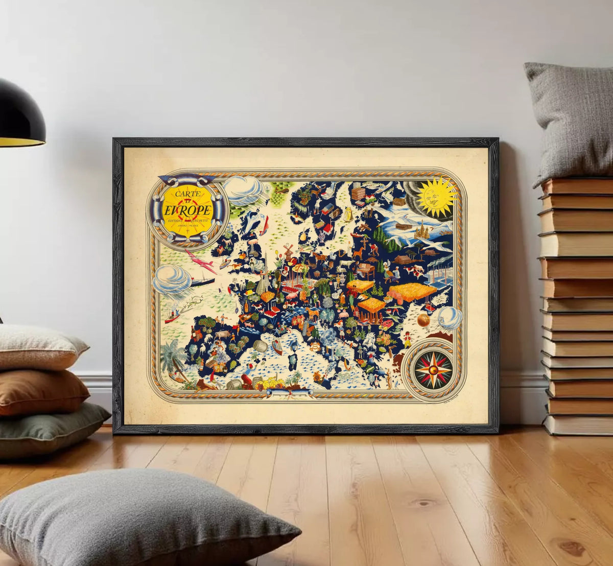 The image is a framed vintage map of Europe, featuring various landmarks, symbols, and illustrations.
