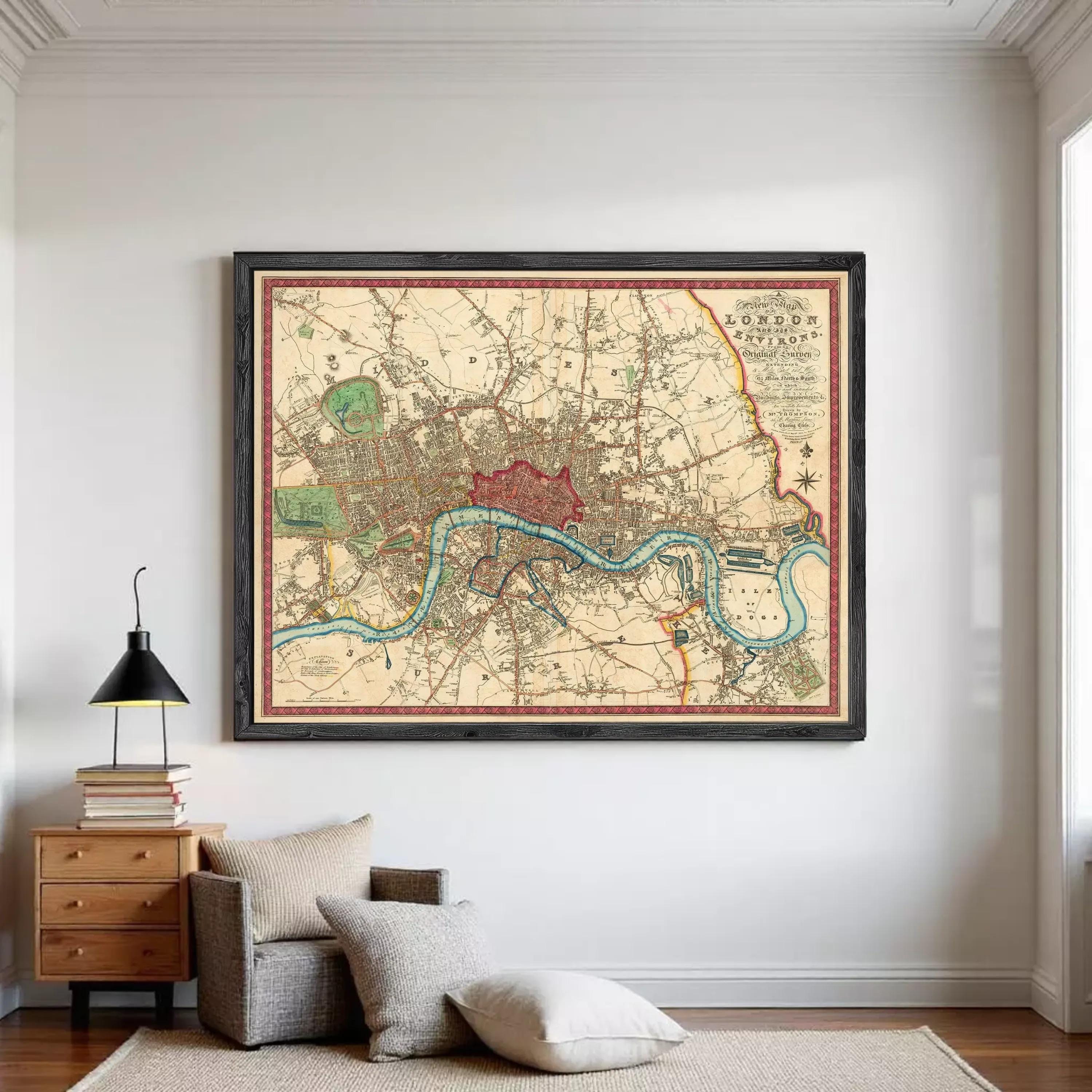 The image is a framed vintage map of London, England, depicting the city's streets, landmarks, and waterways.