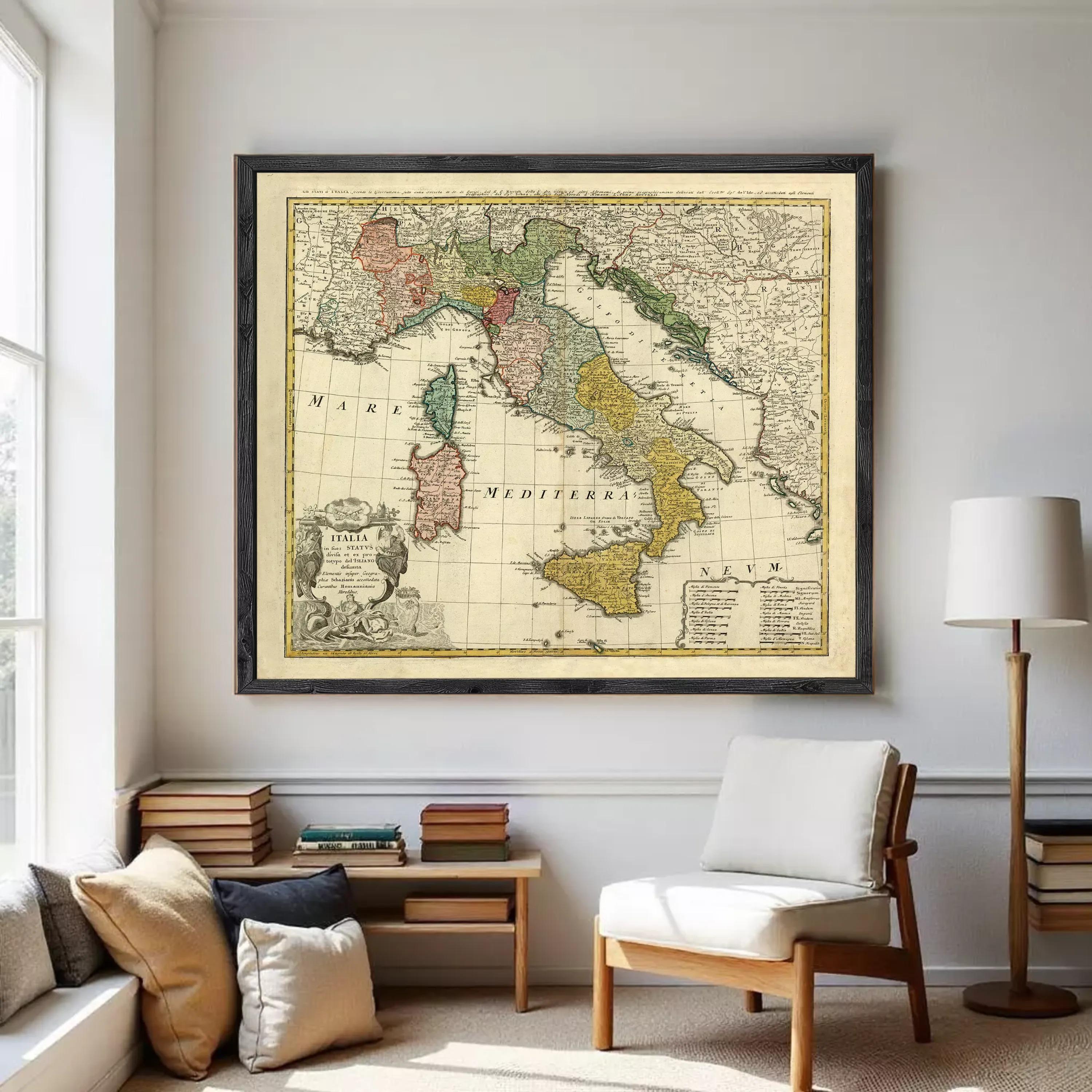 The image is a framed vintage map of Italy, showing the country's geographical layout and surrounding regions.