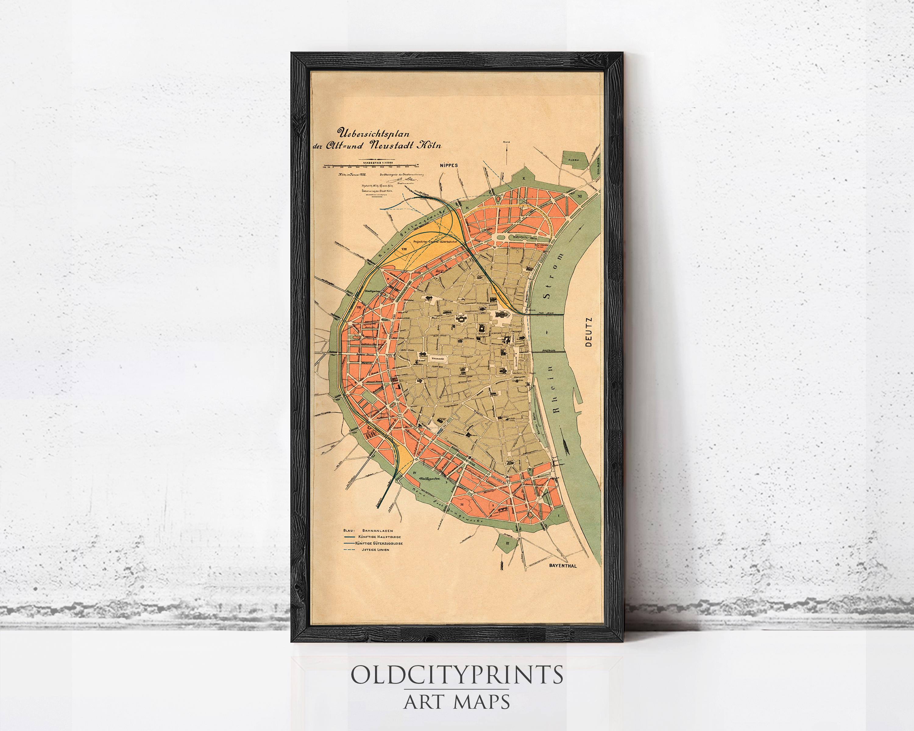 The image is a framed vintage map of a city, likely from the 19th century, with a focus on the city's layout and surrounding areas.