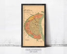 The image is a framed vintage map of a city, likely from the 19th century, with a focus on the city's layout and surrounding areas.
