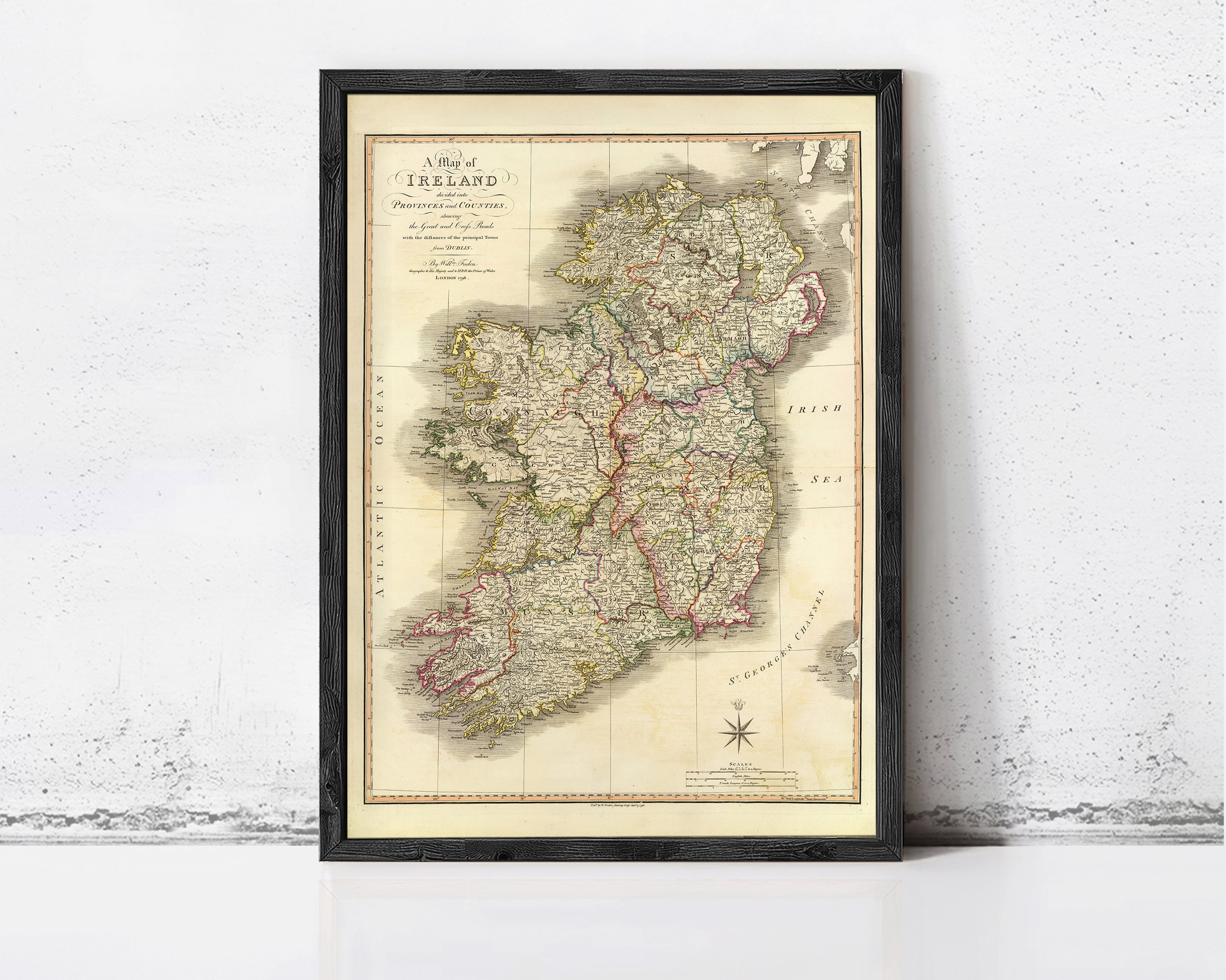 The image is a framed map of Ireland, depicting the country's geographical layout and surrounding areas.