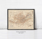 The image is a framed vintage map of Stuttgart, Germany, with a black border and beige color scheme.