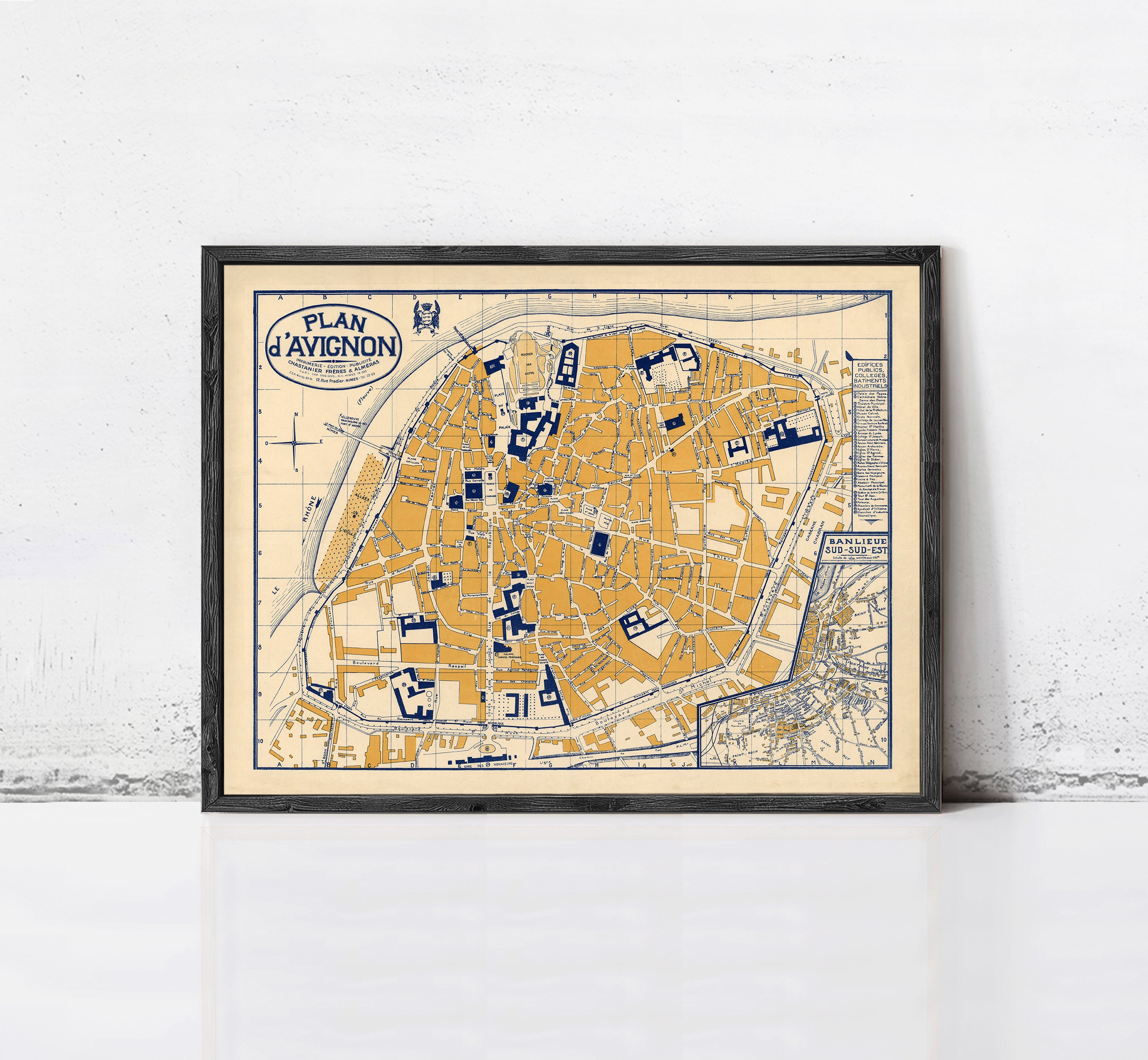 The image is a framed vintage map of the city of Avignon, France, depicting the layout and streets of the city.