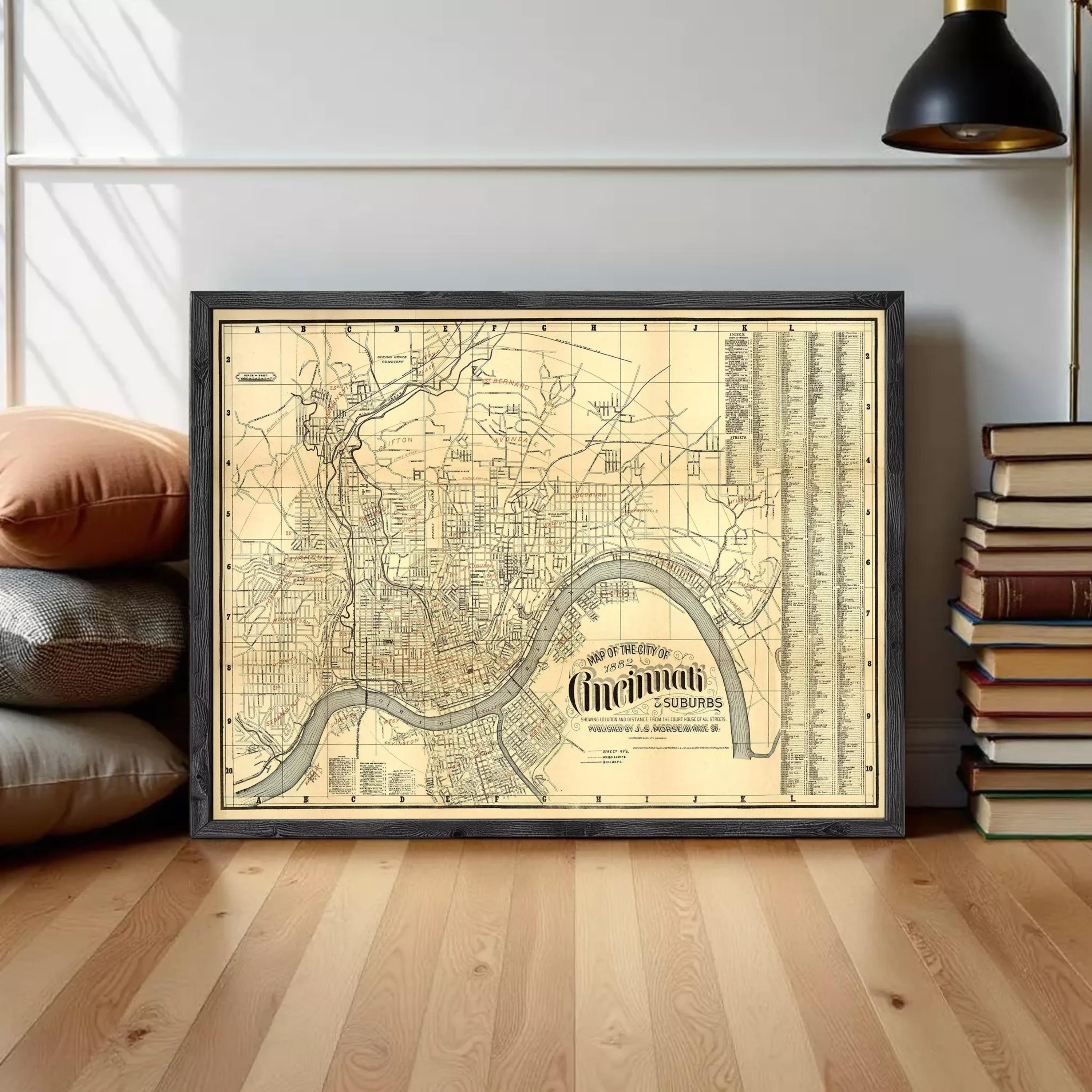 The image is a framed vintage map of Cincinnati, Ohio, showing the city's streets and surrounding areas.