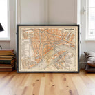 The image is a framed vintage map of Rotterdam, Netherlands, depicting the city's streets and landmarks.