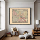 The image is a framed vintage map of Baltimore, Maryland, depicting the city's streets and neighborhoods.