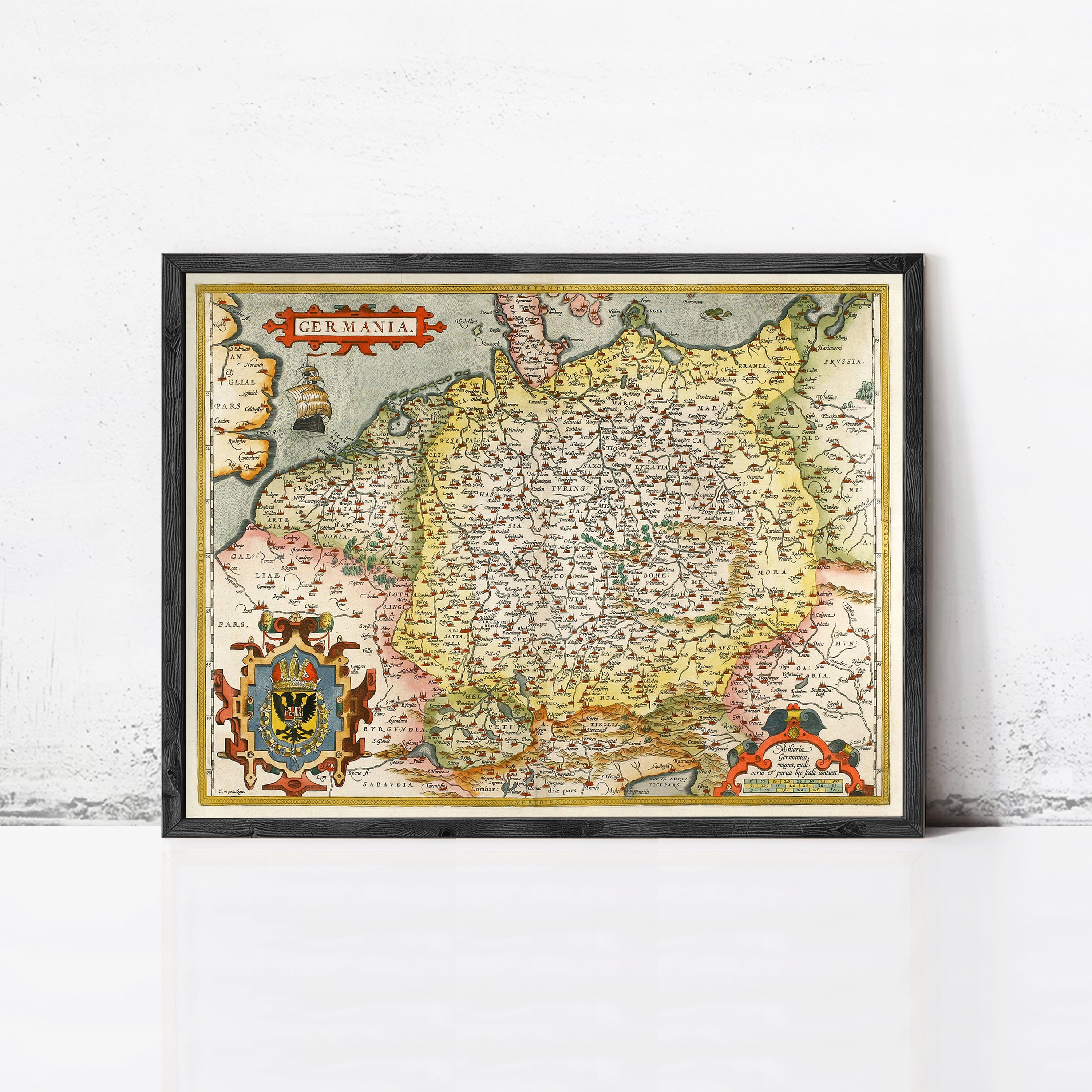 The image is a framed vintage map of Germany, featuring detailed geographical information and a decorative border.