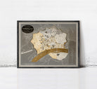The image is a framed map of a city, likely a vintage or historical map, displayed on a wall.
