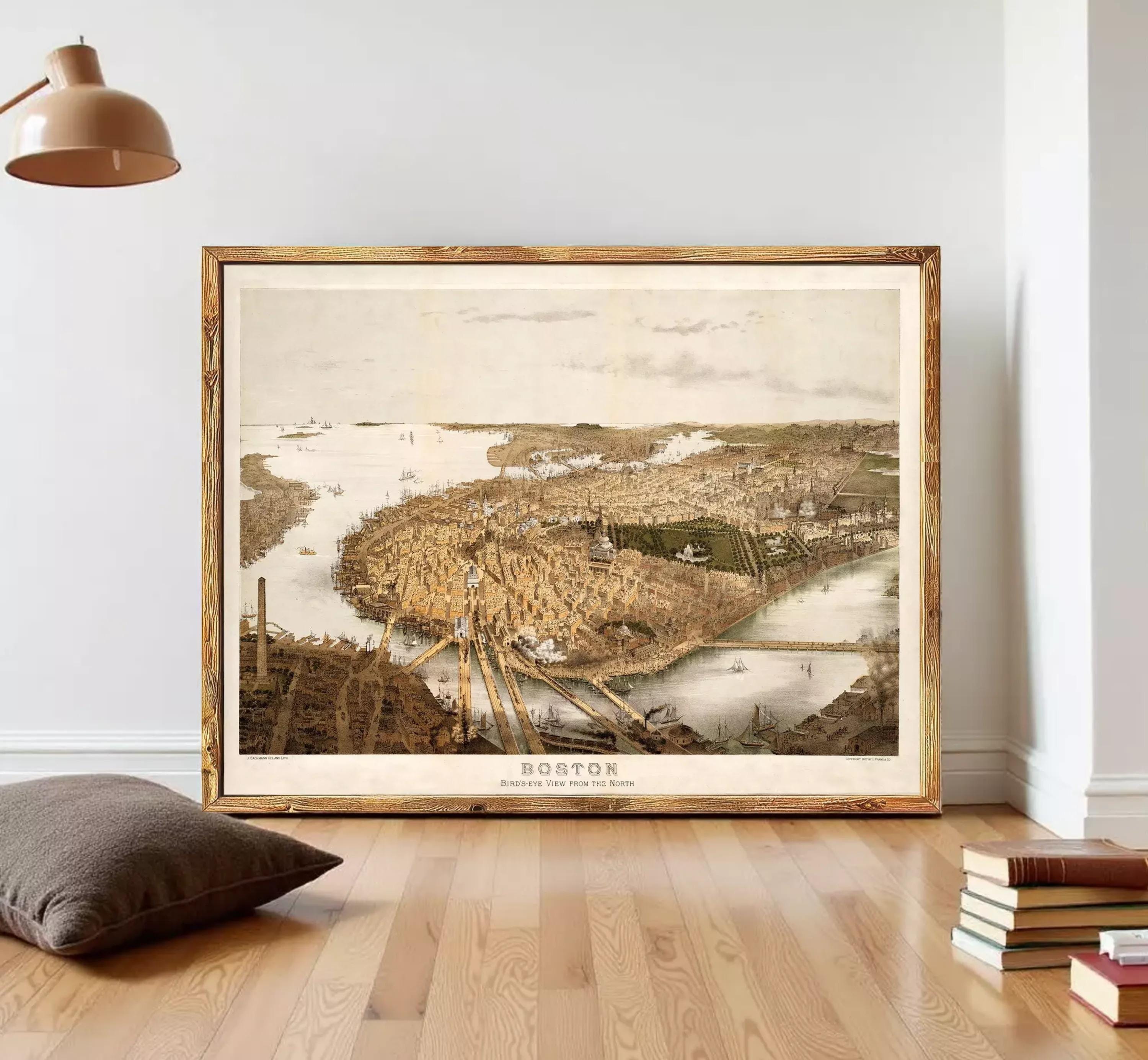 The image is a framed print of a historical map of Boston, depicting the cityscape and surrounding areas.