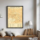 The image is a framed vintage map of Caen, France, depicting the city's layout and surrounding areas.