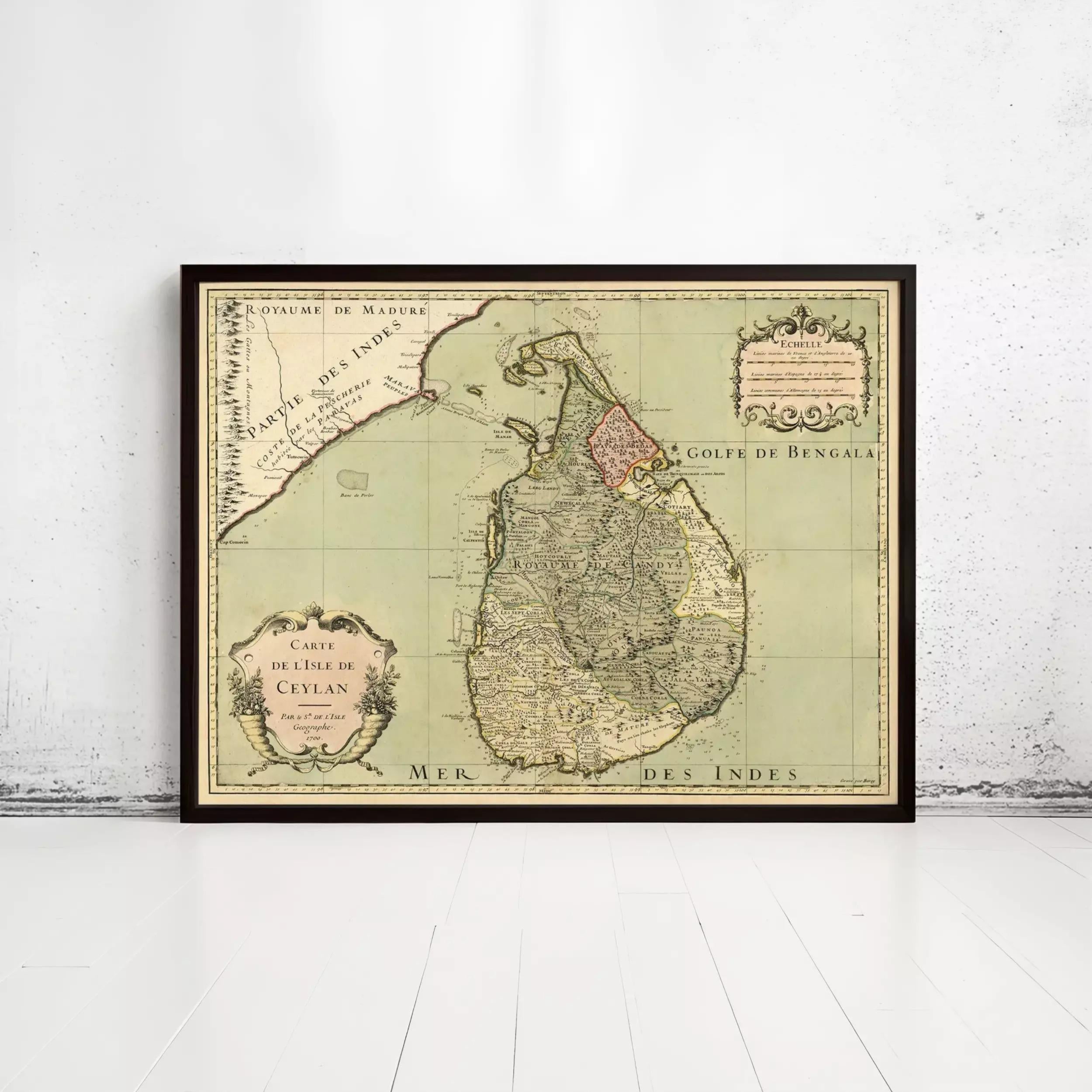 The image is a framed vintage map of Sri Lanka, showing the country's geographical layout and boundaries.
