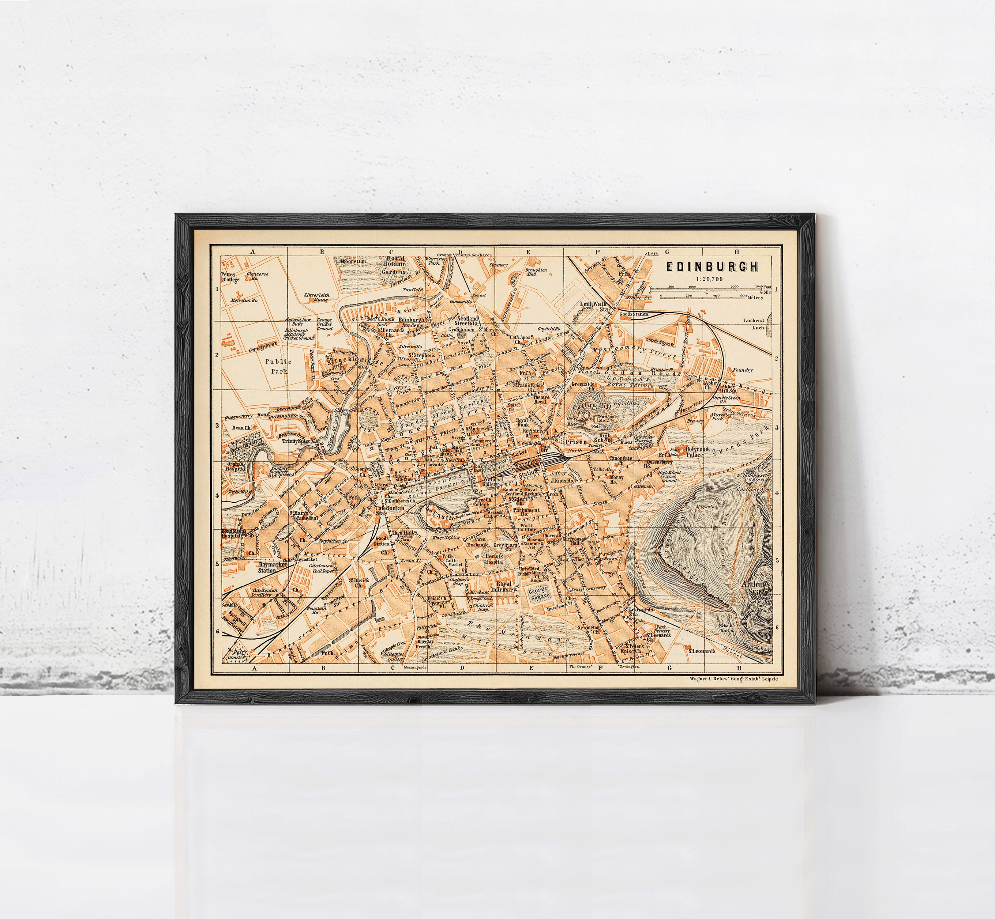 The image is a framed vintage map of Edinburgh, Scotland, depicting the city's layout and surrounding areas.