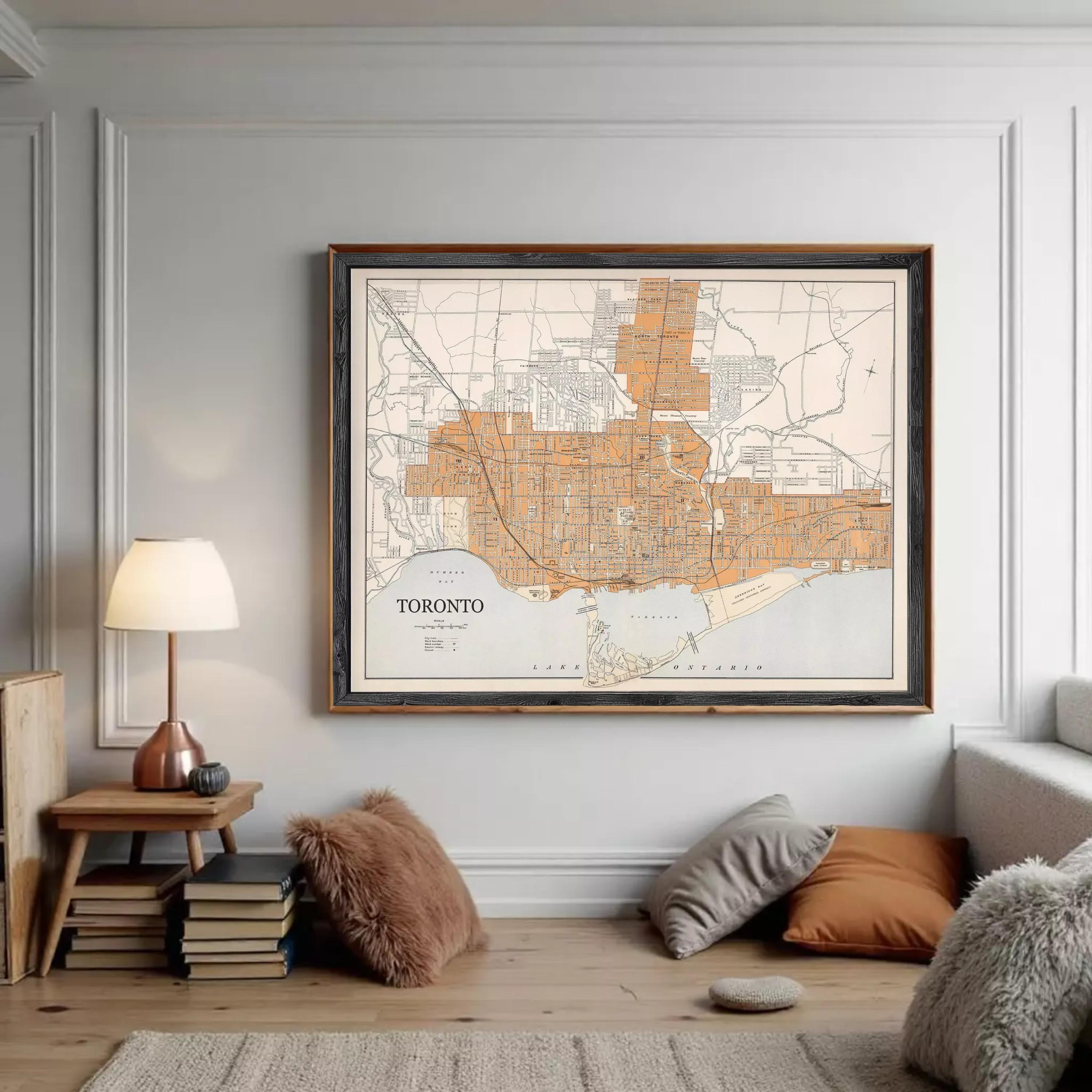 The image is a framed map of Toronto, Canada, depicting the city's streets and surrounding areas.