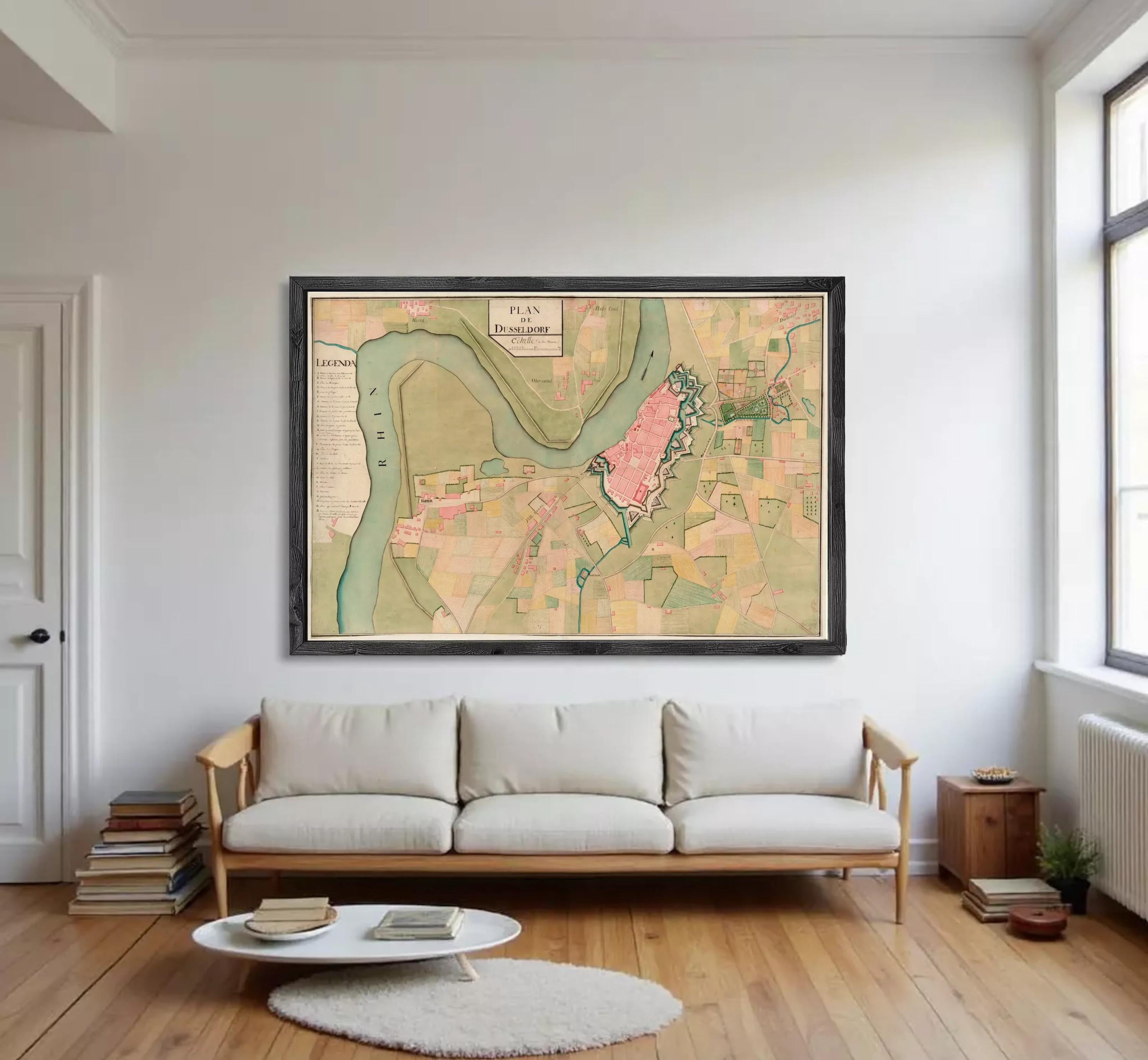 The image is a framed map of a city, depicting various landmarks and geographical features.