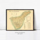 The image is a framed vintage map of the island of Tenerife, Spain, with a black border and a yellow background.