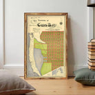 The image is a framed vintage map of the Town of Cos Bay, Oregon, depicting a detailed layout of the area.