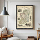 The image is a framed vintage map of Ireland, featuring various landmarks and geographical details.