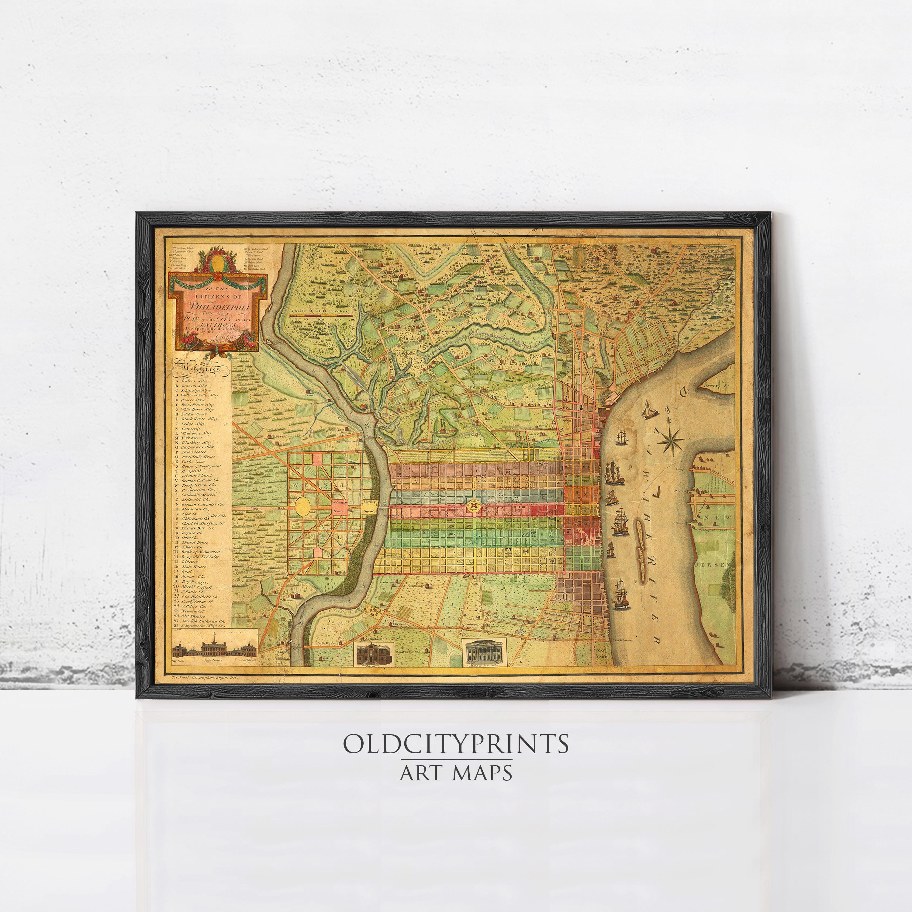 The image is a framed antique map of Philadelphia, Pennsylvania, with detailed cartography and a decorative border.