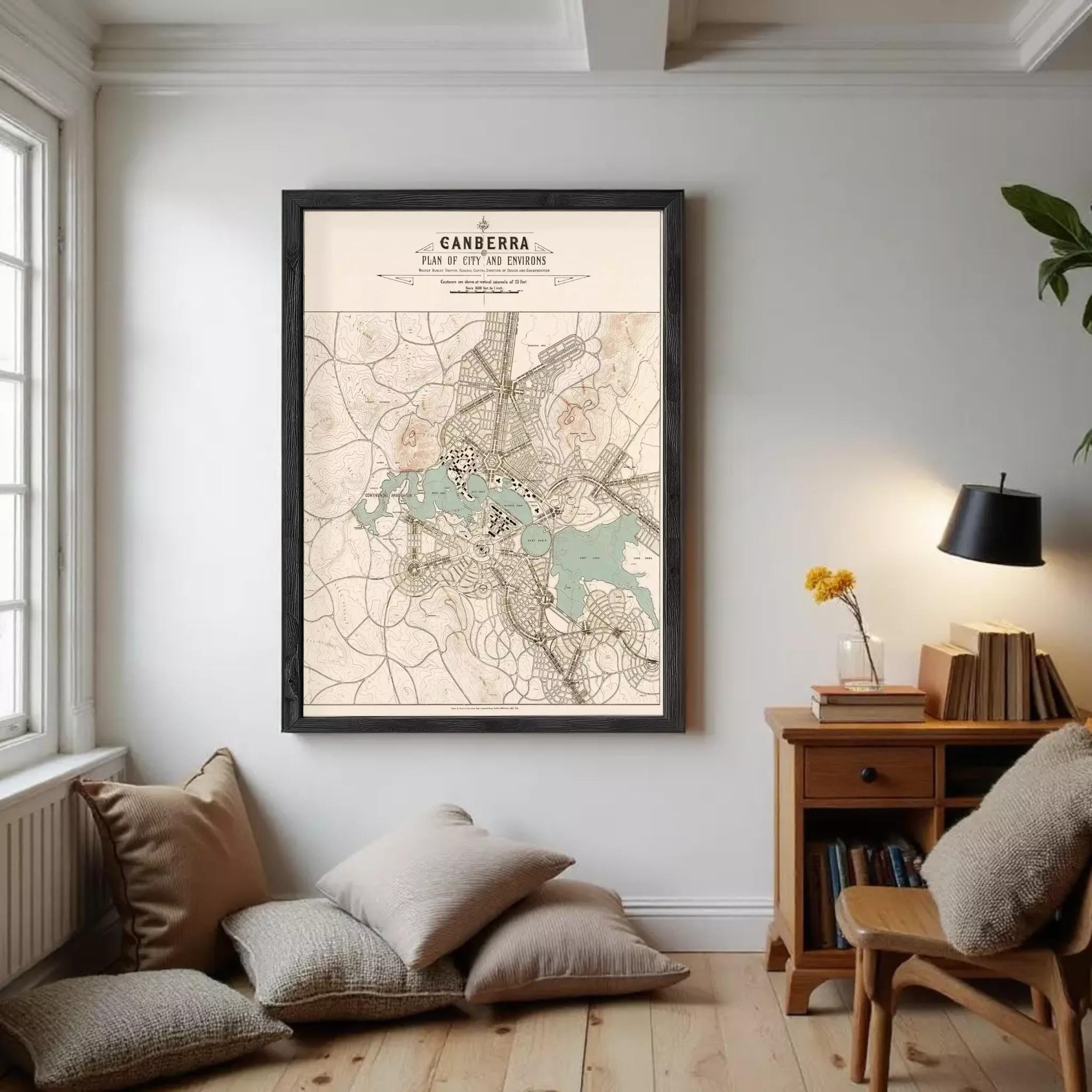 The image is a framed map of the city of canberra, Australia, depicting the city's layout and surrounding areas.