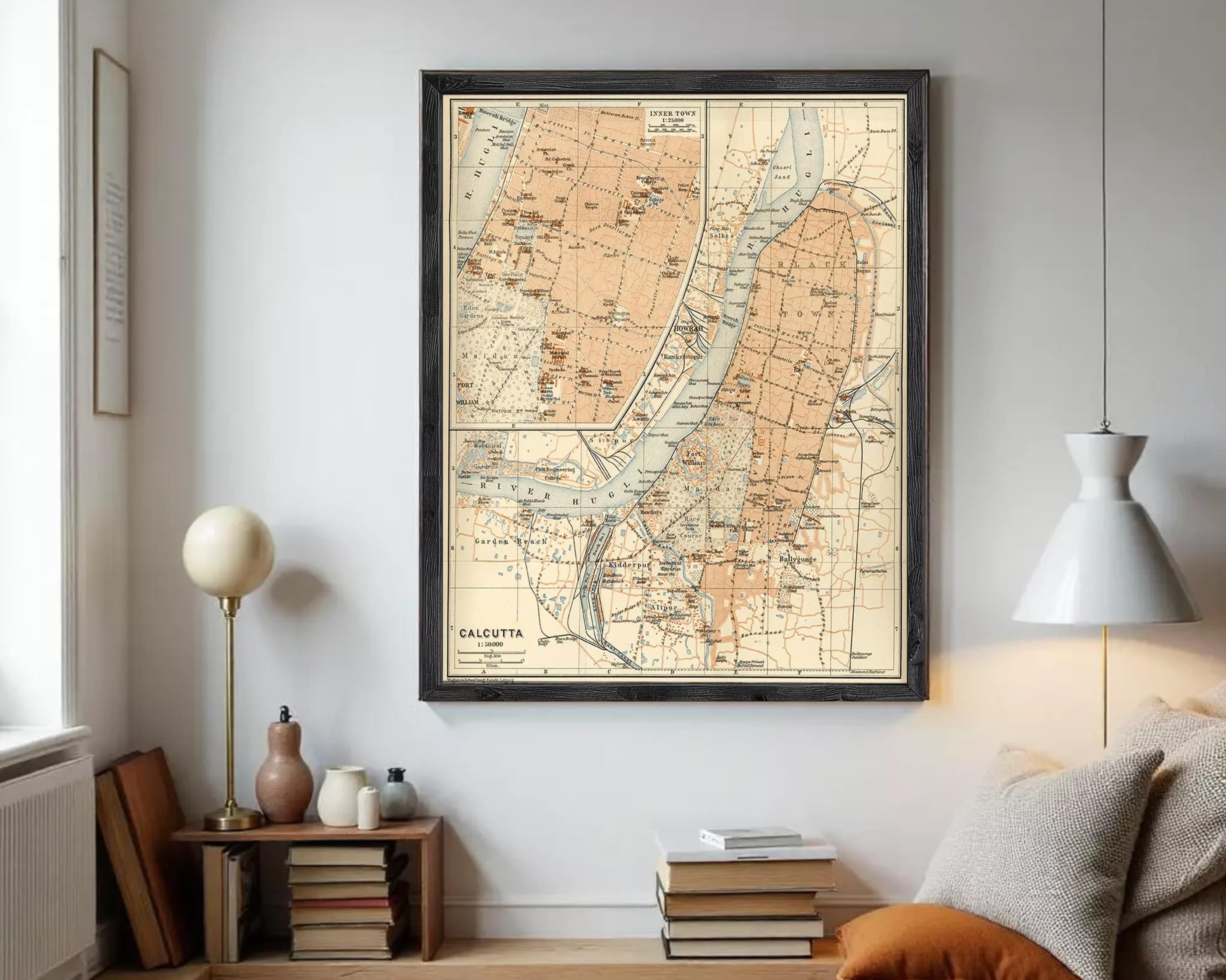 The image is a framed vintage map of Calcutta, India, depicting various landmarks and geographical features.