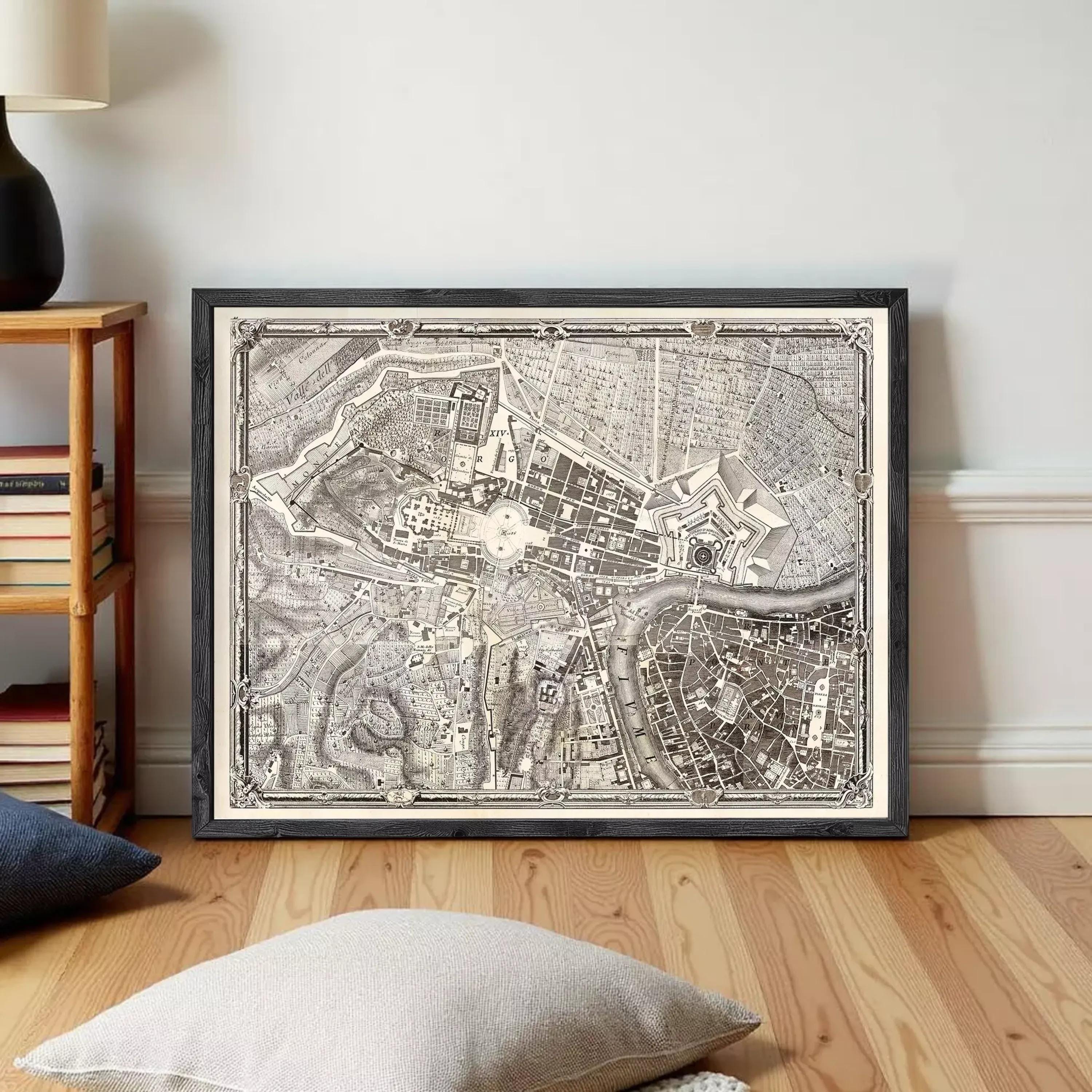 The image is a framed antique map of a city, likely from the 18th century, displayed on a white wall.