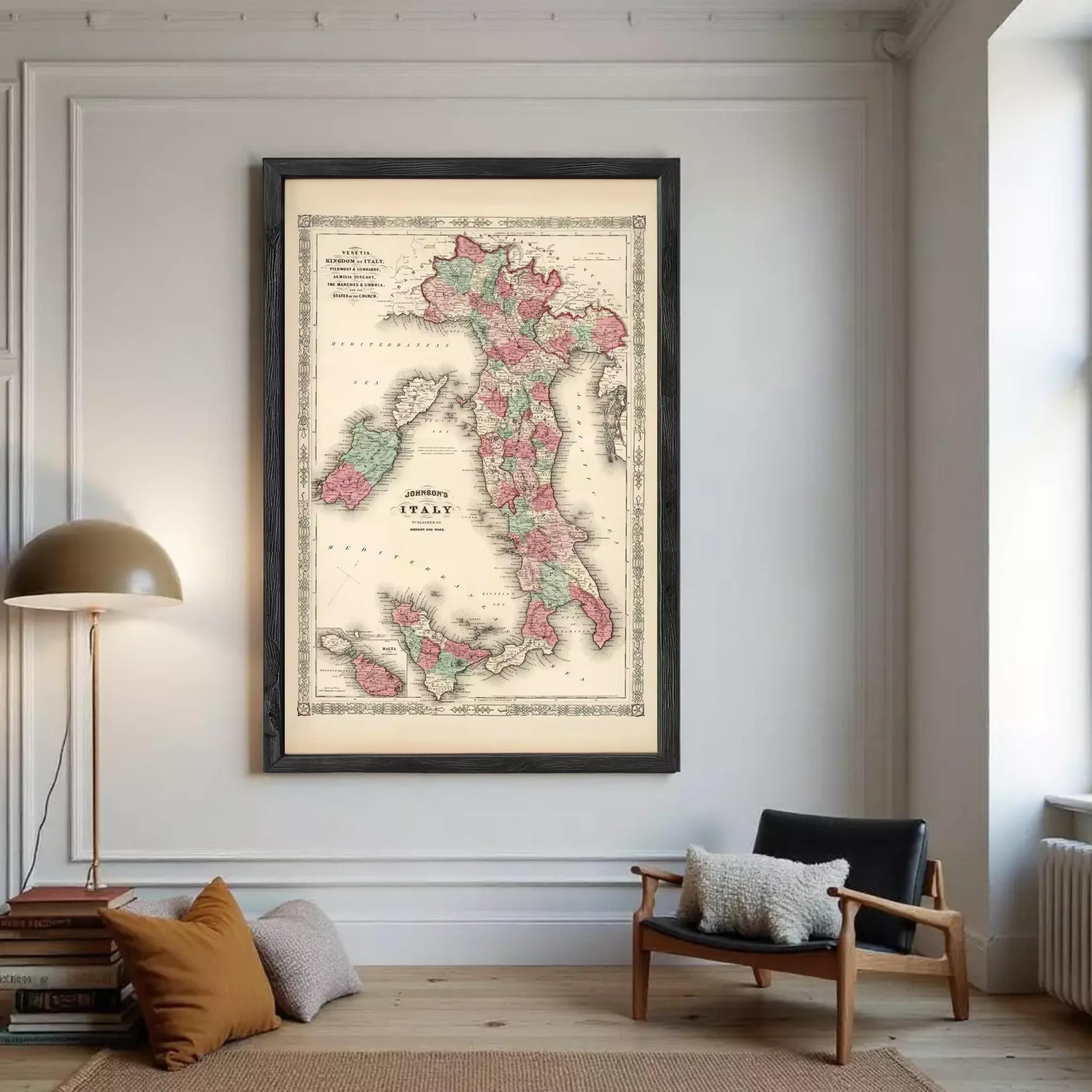 A framed vintage map of Italy, depicting the country in a detailed and colorful manner.