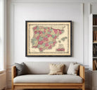 The image is a framed vintage map of Spain, depicting the country's geographical layout and boundaries.