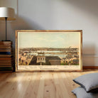 A framed vintage map of Minneapolis, Minnesota, depicting the cityscape and surrounding areas.