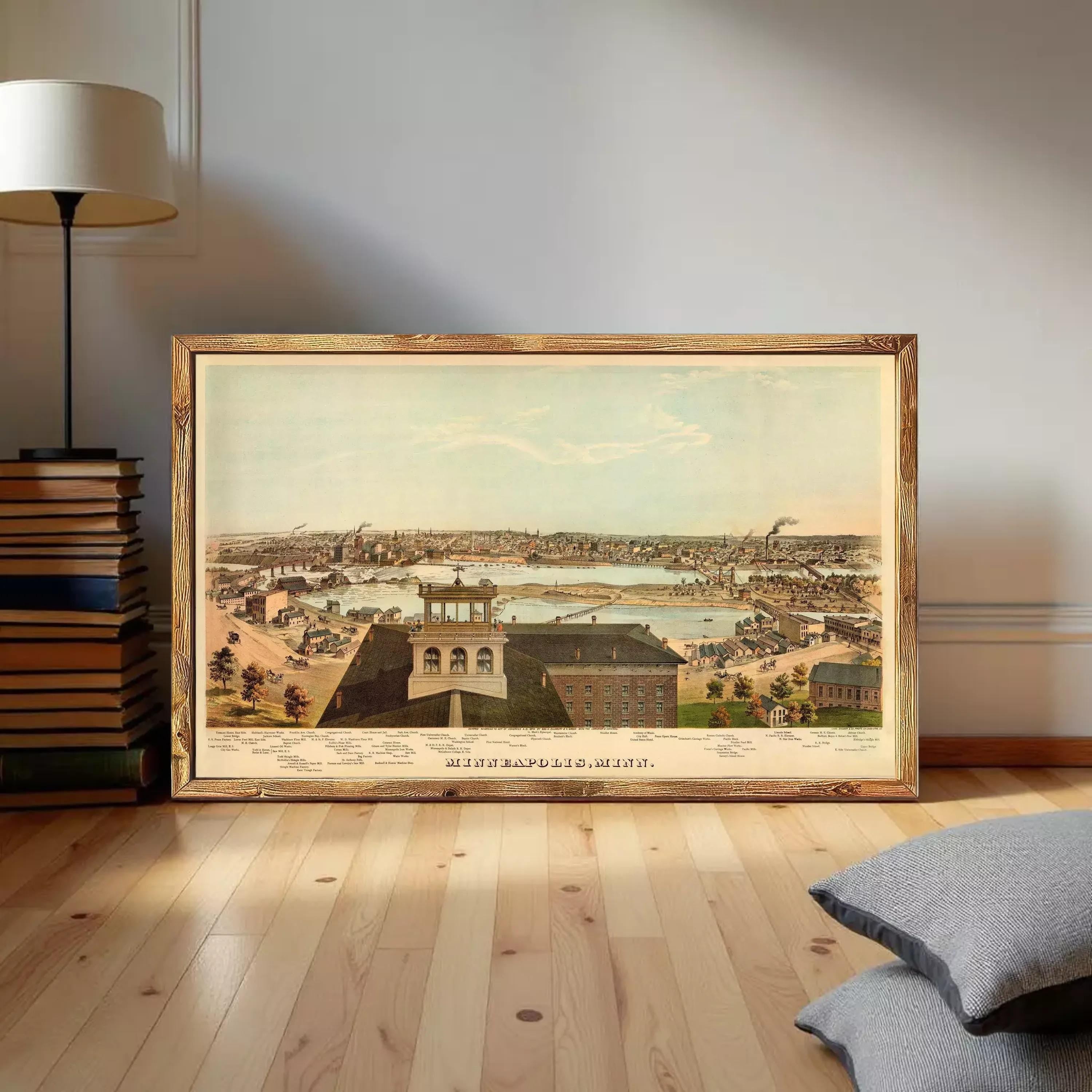 A framed vintage map of Minneapolis, Minnesota, depicting the cityscape and surrounding areas.