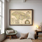 The image is a framed vintage map of Jamaica, featuring detailed geographical information and a decorative border.