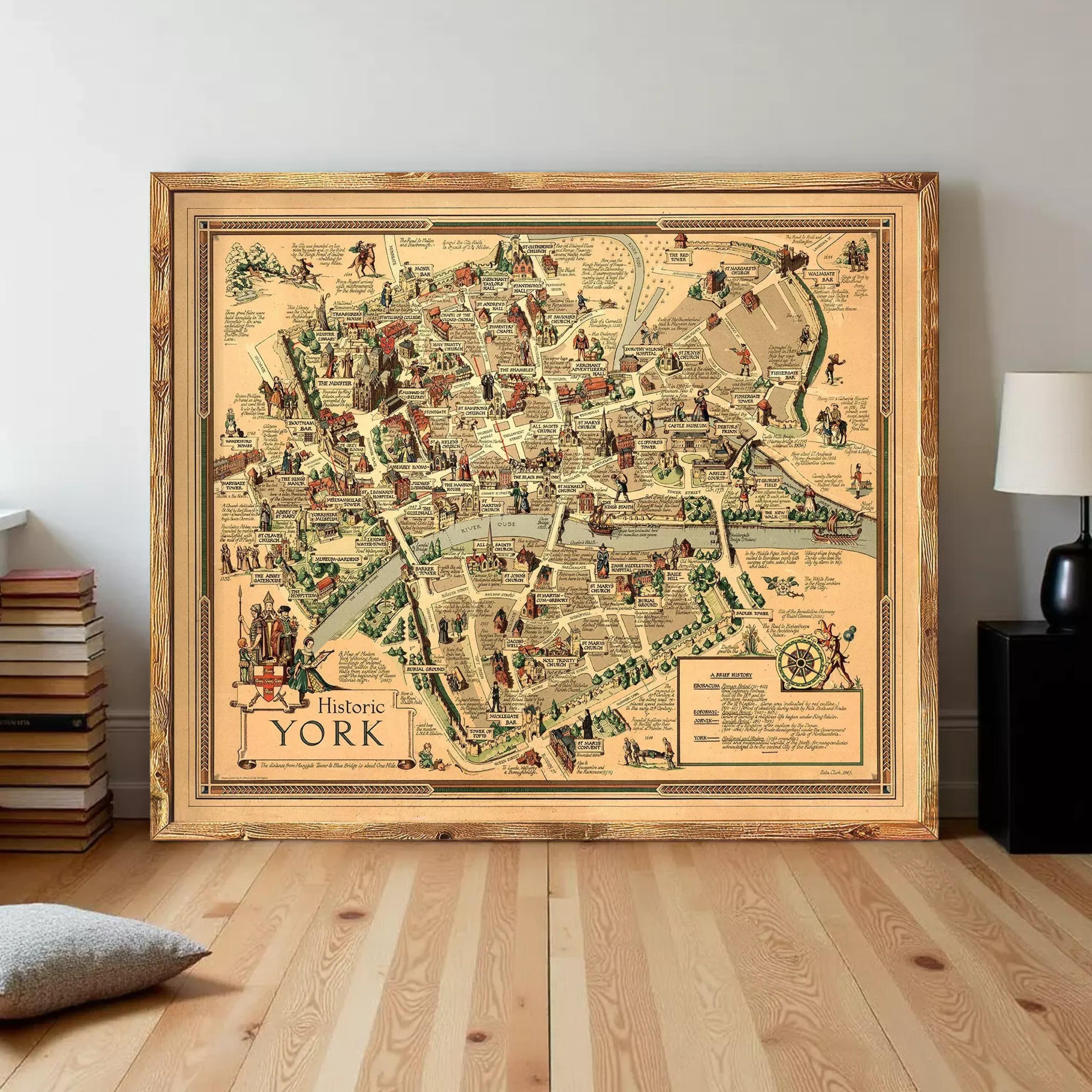 The image is a large framed map of historic York, with various landmarks and streets depicted in a detailed and colorful manner.